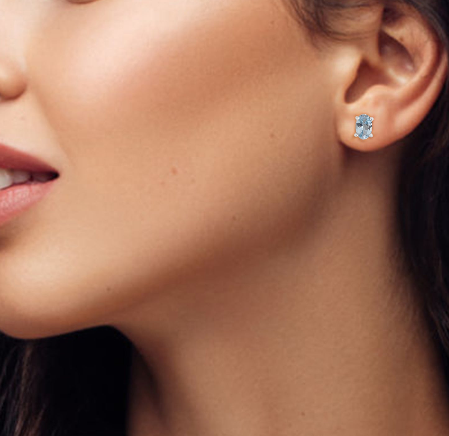Oval Blue Topaz Stud Earrings