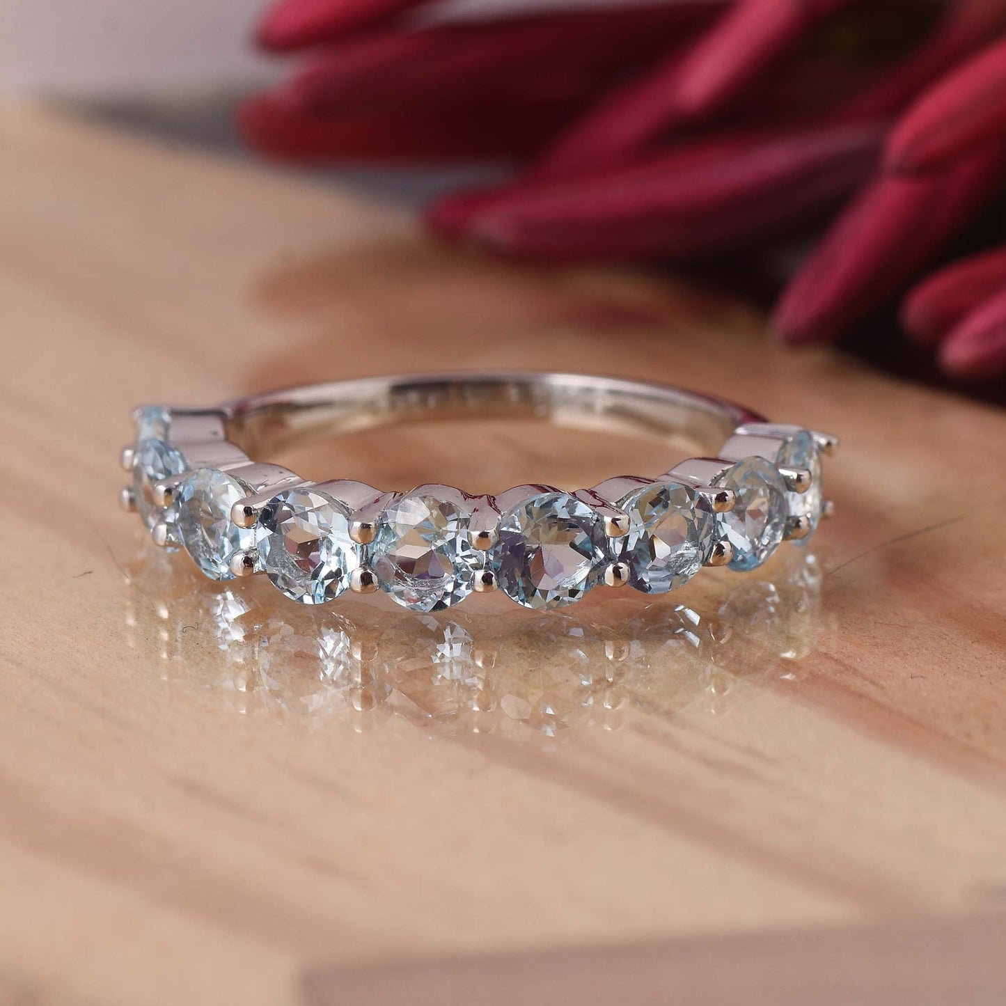Round Aquamarine Eternity Band